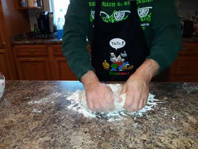 Kneading algae bread dough on a floured countertop (2)